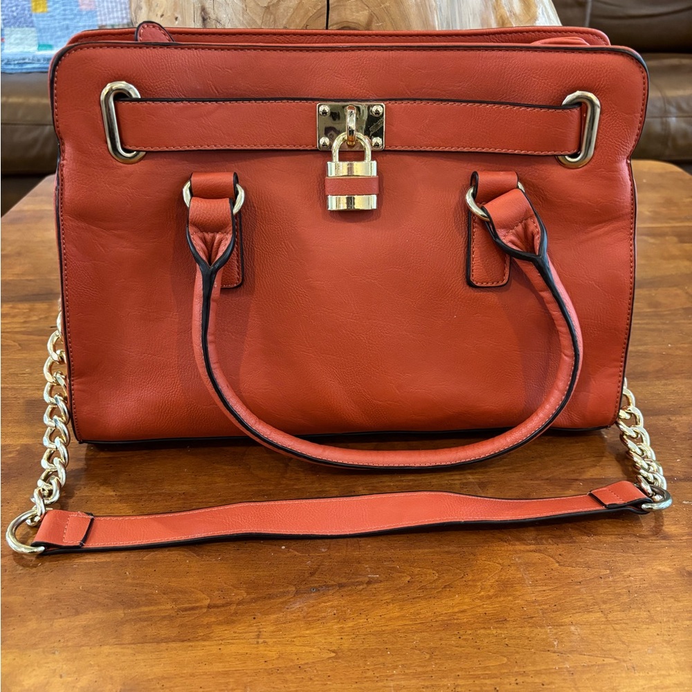 Charming Charlie pumpkin color bag